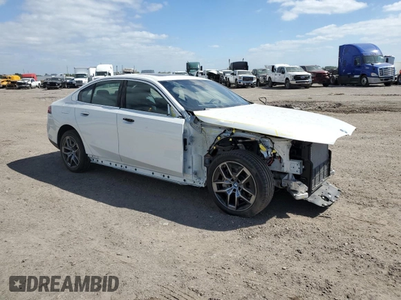 2024 BMW i5 eDrive40 with VIN WBY33FK05RCR50188, listed as a Copart auction lot 52953195 with 423 mi miles and Salvage title. Bid and sale history available at DreamBid. Image 4.