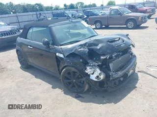 2013 MINI Convertible S with VIN WMWZP3C59DT550746, listed as a IAAI auction lot 39538986 with 59,934 mi miles and . Bid and sale history available at DreamBid. Image 1.