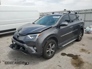2016 Toyota RAV4 XLE with VIN 2T3RFREV0GW412875, listed as a Copart auction lot 59497545 with 226,604 mi miles and Salvage title. Bid and sale history available at DreamBid. Image 1.