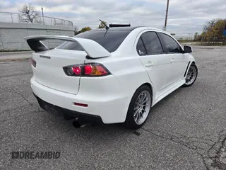 2010 Mitsubishi Lancer Evolution GSR with VIN JA32W8FV3AU021698, listed as a Copart auction lot 80026994 with 10,075 mi miles and Clean Title. Bid and sale history available at DreamBid. Image 4.