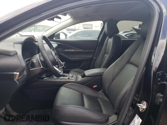 2022 Mazda CX-30 2.5 Turbo with VIN 3MVDMBAY0NM447128, listed as a Copart auction lot 54007924 with 10,596 mi miles and Salvage Title. Bid and sale history available at DreamBid. Image 7.
