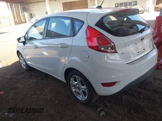 2014 Ford Fiesta SE with VIN 3FADP4EJ7EM111919, listed as a IAAI auction lot 42063116 with 154,137 mi miles and . Bid and sale history available at DreamBid. Image 3.