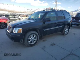 2005 GMC Envoy SLE with VIN 1GKDT13S452285975, listed as a Copart auction lot 46371785 with 358,411 mi miles and Salvage Title. Bid and sale history available at carsss.com. Image 1.
