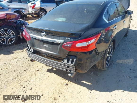 2018 Nissan Altima SR with VIN 1N4AL3AP9JC228304, listed as a IAAI auction lot 41883035 with 53,168 mi miles and . Bid and sale history available at DreamBid. Image 6.