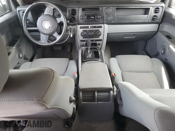 2007 Jeep Commander Sport z VIN 1J8HG48K77C624276, wystawiony jako Copart lot #53336525 z przebiegiem 167 380 mil mil oraz Szkoda całkowita • Salvage title. Historia ofert i sprzedaży dostępna na DreamBid. Obrazek 8.