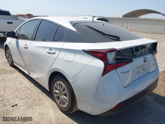 2021 Toyota Prius L Eco with VIN JTDKAMFU6M3141263, listed as a IAAI auction lot 40593951 with 95,921 mi miles. Bid and sale history available at carsss.com. Image 3.