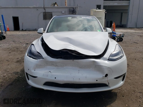 2022 Tesla Model Y Performance z VIN 7SAYGDEF4NF389191, wystawiony jako Copart lot #61443135 z przebiegiem 70 612 mil mil oraz Szkoda całkowita • Salvage title. Historia ofert i sprzedaży dostępna na DreamBid. Obrazek 5.