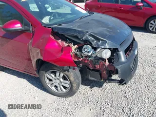 2013 Chevrolet Sonic LT with VIN 1G1JC5SH3D4256507, listed as a IAAI auction lot 42235009 with 117,804 mi miles and . Bid and sale history available at DreamBid. Image 13.