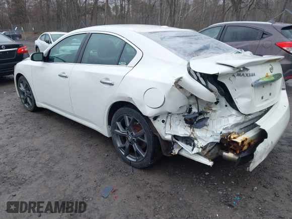 2014 Nissan Maxima S with VIN 1N4AA5AP4EC484583, listed as a IAAI auction lot 41972065 with 173,332 mi miles and . Bid and sale history available at DreamBid. Image 3.
