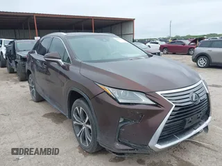 2016 Lexus RX 350 z VIN 2T2ZZMCA5GC029529, wystawiony jako IAAI lot #41953567 z przebiegiem 133 460 mil mil oraz . Historia ofert i sprzedaży dostępna na DreamBid. Obrazek 1.