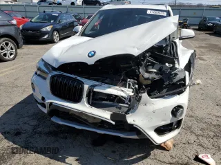 2018 BMW X1 xDrive28i with VIN WBXHT3C30J5F92074, listed as a Copart auction lot 51069535 with 116,381 mi miles and Salvage Title. Bid and sale history available at carsss.com. Image 5.