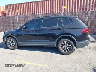 2021 Volkswagen Tiguan S with VIN 3VV1B7AX2MM142289, listed as a IAAI auction lot 42403346 with 71,182 mi miles and . Bid and sale history available at DreamBid. Image 14.