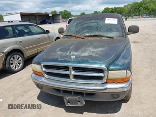 1998 Dodge Dakota SLT with VIN 1B7GL22X4WS554408, listed as a IAAI auction lot 42202021 with 147,765 mi miles. Bid and sale history available at carsss.com. Image 6.
