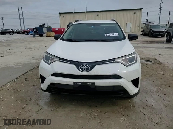 2016 Toyota RAV4 LE with VIN JTMZFREV3GJ088139, listed as a Copart auction lot 51243455 with 130,819 mi miles and Salvage Title. Bid and sale history available at carsss.com. Image 15.