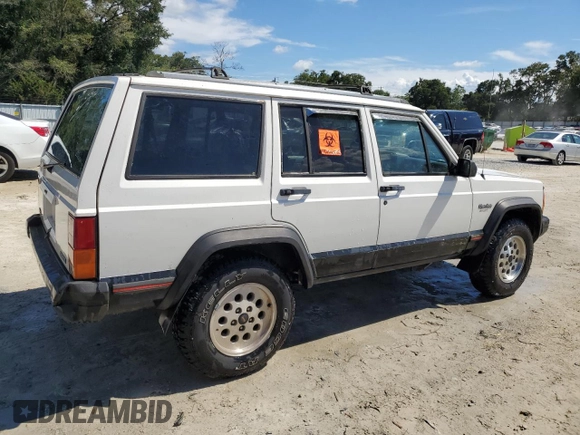 1996 Jeep Cherokee Sport with VIN 1J4FT68S4TL131956, listed as a Copart auction lot 74568064 with 174,014 mi miles and Non Repairable. Bid and sale history available at carsss.com. Image 3.