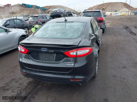 2015 Ford Fusion Titanium Hybrid with VIN 3FA6P0RU6FR299374, listed as a IAAI auction lot 41576007 with 191,285 mi miles. Bid and sale history available at carsss.com. Image 16.