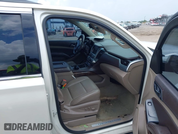 2015 Chevrolet Tahoe LT with VIN 1GNSCBKC0FR739951, listed as a IAAI auction lot 42332982 with 133,046 mi miles and . Bid and sale history available at DreamBid. Image 5.