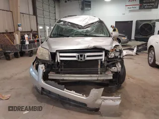 2006 Honda Pilot EX with VIN 2HKYF18416H534697, listed as a IAAI auction lot 41715642 with 224,093 mi miles and . Bid and sale history available at DreamBid. Image 6.