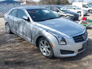 2013 Cadillac ATS z VIN 1G6AA5RX6D0176977, wystawiony jako IAAI lot #41822203 z przebiegiem 158 263 mil mil oraz . Historia ofert i sprzedaży dostępna na DreamBid. Obrazek 1.