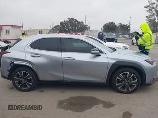 2023 Lexus UX 250h with VIN JTHX6JBH6P2143926, listed as a IAAI auction lot 42180779 with 65,106 mi miles and . Bid and sale history available at DreamBid. Image 14.