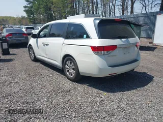 2015 Honda Odyssey EX-L with VIN 5FNRL5H64FB069742, listed as a IAAI auction lot 42101807 with 152,611 mi miles and . Bid and sale history available at DreamBid. Image 3.