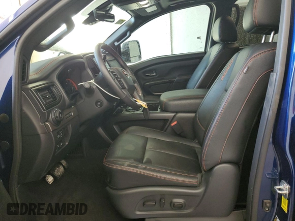 2024 Nissan Titan SV with VIN 1N6AA1FB2RN104714, listed as a Copart auction lot 56576955 with 25,800 mi miles and Salvage title. Bid and sale history available at DreamBid. Image 7.
