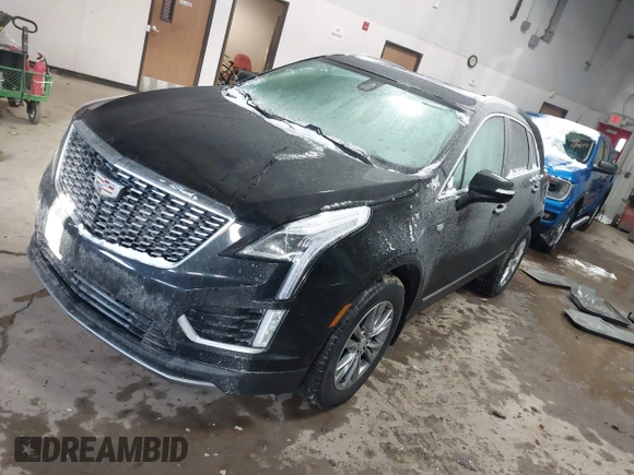 2021 Cadillac XT5 FWD Premium Luxury with VIN 1GYKNCRS3MZ198651, listed as a IAAI auction lot 41607734 with 49,275 mi miles. Bid and sale history available at carsss.com. Image 17.