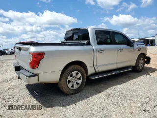 2017 Nissan Titan SV z VIN 1N6AA1E68HN500682, wystawiony jako Copart lot #57562415 z przebiegiem 185 539 mil mil oraz Szkoda całkowita • Salvage title. Historia ofert i sprzedaży dostępna na DreamBid. Obrazek 3.
