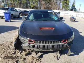 2018 Dodge Charger Daytona with VIN 2C3CDXCT4JH283018, listed as a Copart auction lot 48707905 with 121,624 mi miles and Salvage title. Bid and sale history available at DreamBid. Image 5.