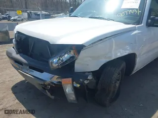 2003 Chevrolet Silverado 1500 Work Truck with VIN 1GCEC19X33Z360141, listed as a IAAI auction lot 42077431 with 180,000 mi miles. Bid and sale history available at carsss.com. Image 6.