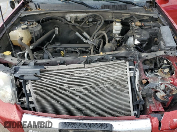 2010 Ford Escape Limited with VIN 1FMCU0E71AKB54080, listed as a Copart auction lot 55175795 with 246,064 mi miles and Salvage title. Bid and sale history available at DreamBid. Image 12.