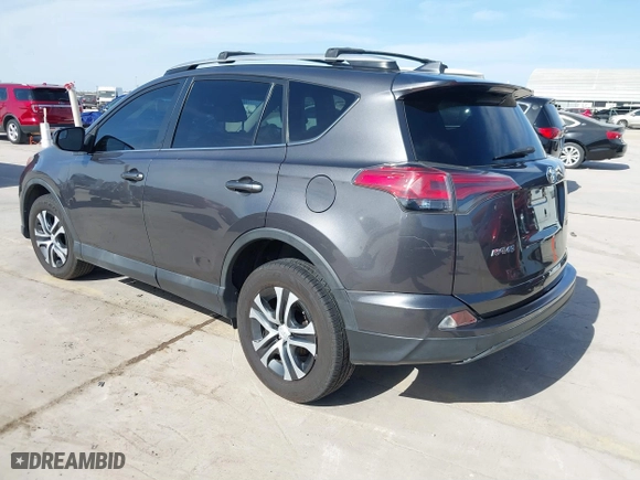 2018 Toyota RAV4 LE with VIN 2T3ZFREV4JW412661, listed as a IAAI auction lot 41781229 with 140,131 mi miles. Bid and sale history available at carsss.com. Image 3.