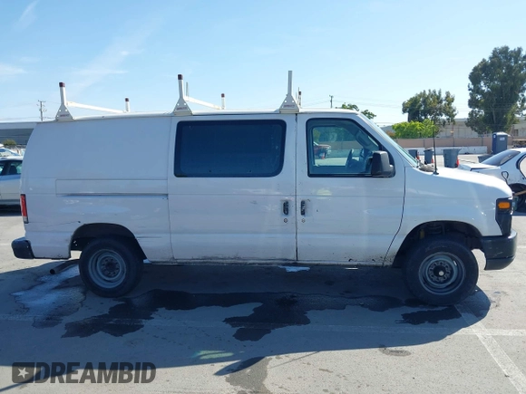 2013 Ford Econoline Cargo Commercial with VIN 1FTNE1EW7DDA98789, listed as a IAAI auction lot 42382594 with 251,602 mi miles and . Bid and sale history available at DreamBid. Image 13.