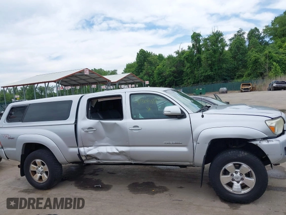 2013 Toyota Tacoma with VIN 3TMMU4FN1DM055477, listed as a IAAI auction lot 42306479 with 191,792 mi miles and . Bid and sale history available at DreamBid. Image 13.