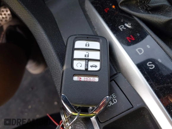 2021 Honda Civic Sport with VIN 2HGFC2F84MH536320, listed as a IAAI auction lot 42145631 with 50,664 mi miles and . Bid and sale history available at DreamBid. Image 11.