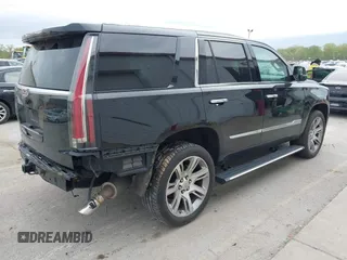 2018 Cadillac Escalade Premium Luxury z VIN 1GYS4CKJ1JR279129, wystawiony jako IAAI lot #42183231 z przebiegiem 130 086 mil mil oraz . Historia ofert i sprzedaży dostępna na DreamBid. Obrazek 4.