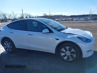 2022 Tesla Model Y Long Range with VIN 7SAYGDEE2NF440548, listed as a IAAI auction lot 41360276 with 19,714 mi miles and . Bid and sale history available at carsss.com. Image 13.
