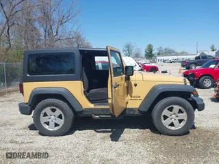 2013 Jeep Wrangler Sport with VIN 1C4AJWAG8DL676619, listed as a IAAI auction lot 41942627 with 130,306 mi miles. Bid and sale history available at carsss.com. Image 14.