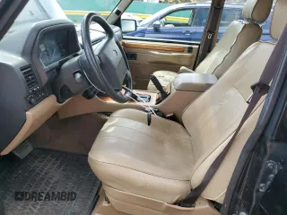 1995 Land Rover Range Rover County Classic z VIN SALHE1243SA659366, wystawiony jako Copart lot #56952765 z przebiegiem 218 223 mil mil oraz Szkoda całkowita • Salvage title. Historia ofert i sprzedaży dostępna na DreamBid. Obrazek 7.