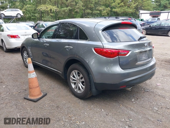 2014 Infiniti QX70 with VIN JN8CS1MW9EM413406, listed as a IAAI auction lot 40269302 with 123,957 mi miles and . Bid and sale history available at DreamBid. Image 3.