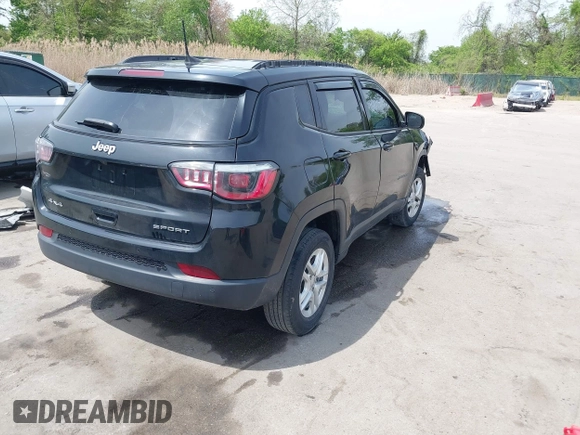 2018 Jeep Compass Sport z VIN 3C4NJDAB3JT245518, wystawiony jako IAAI lot #42094119 z przebiegiem 96 915 mil mil oraz . Historia ofert i sprzedaży dostępna na DreamBid. Obrazek 4.