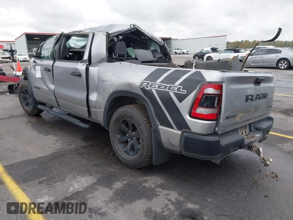 2021 Ram 1500 Rebel with VIN 1C6SRFLT0MN734774, listed as a IAAI auction lot 41075676 with 95,808 mi miles and . Bid and sale history available at DreamBid. Image 3.
