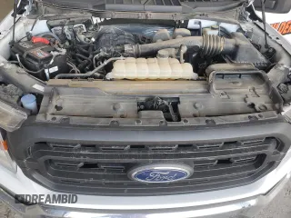 2021 Ford F-150 XL with VIN 1FTMF1EB4MKE11721, listed as a Copart auction lot 65990284 with Not provided miles and Salvage title. Bid and sale history available at DreamBid. Image 11.