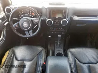 2016 Jeep Wrangler Unlimited Sahara with VIN 1C4HJWEG9GL103631, listed as a Copart auction lot 60530885 with 232,683 mi miles and Salvage title. Bid and sale history available at DreamBid. Image 8.