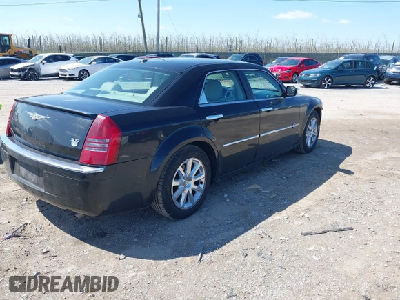 2006 Chrysler 300 C with VIN 2C3LA63H96H490736, listed as a IAAI auction lot 41998112 with 184,090 mi miles. Bid and sale history available at carsss.com. Image 4.