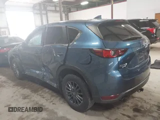 2019 Mazda CX-5 Touring with VIN JM3KFBCM1K0584369, listed as a IAAI auction lot 41657765 with 77,934 mi miles. Bid and sale history available at carsss.com. Image 3.