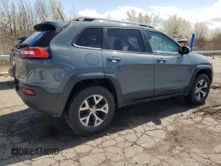 2014 Jeep Cherokee Trailhawk with VIN 1C4PJMBB4EW203320, listed as a Copart auction lot 53875305 with 112,425 mi miles and Clean Title. Bid and sale history available at carsss.com. Image 3.