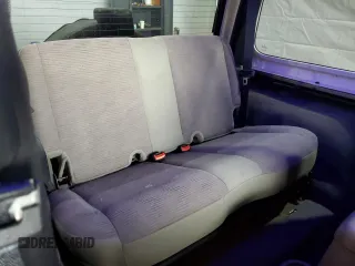 2005 Jeep Wrangler Sport z VIN 1J4FA49S75P325028, wystawiony jako Copart lot #56942315 z przebiegiem 169 988 mil mil oraz Szkoda całkowita • Salvage title. Historia ofert i sprzedaży dostępna na DreamBid. Obrazek 10.
