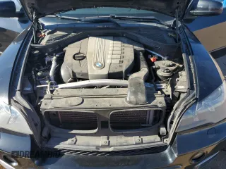 2012 BMW X5 35d with VIN 5UXZW0C57CL667663, listed as a Copart auction lot 63496695 with 116,218 mi miles and Clean title. Bid and sale history available at DreamBid. Image 12.