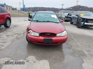 1998 Ford Contour z VIN 1FAFP6531WK303884, wystawiony jako IAAI lot #41532006 z przebiegiem 110 001 mil mil oraz . Historia ofert i sprzedaży dostępna na DreamBid. Obrazek 12.